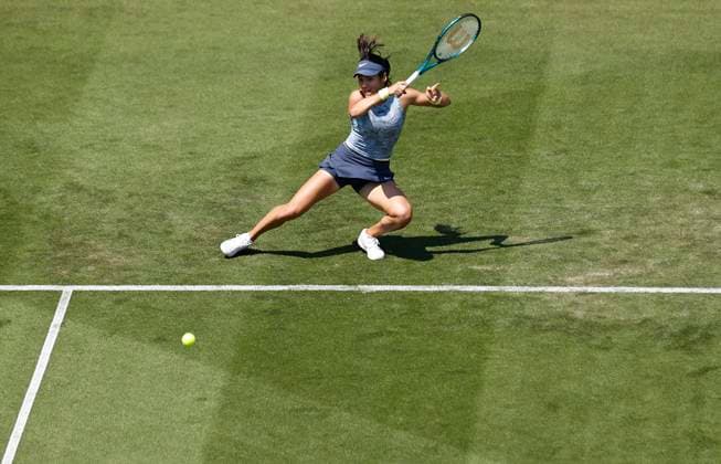 25th June 2024; Devonshire Park, Eastbourne, East Sussex, England: Rothesay International Eastbourne, Day 2, Emma Raducanu (GBR) plays a forehand against Sloane Stephens (USA) womens singles  ActionPlus12660390 HongboxChen