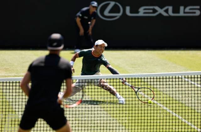 25th June 2024; Devonshire Park, Eastbourne, East Sussex, England: Rothesay International Eastbourne, Day 2; Yoshihito Nishioka (JPN) plays a forehand against Liam Broady (GBR) mens singles  ActionPlus12660372 HongboxChen