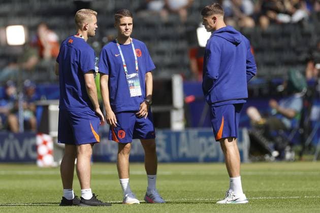 BERLIN, Olympia Stadium , 25-06-2024 , European Football Championship Euro2024, Group stage match no.31 between Netherlands and Austria. Netherlands player Joey Veerman (M) Netherlands player Matthijs de Ligt (L) Netherlands player Mickey van de Ven (R) Netherlands - Austria (Euro2024)  x25595138x Copyright: