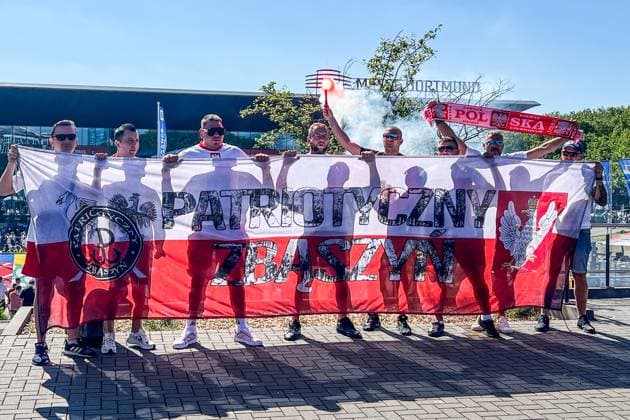 Polish fans celebrate with banner, scarf and Bengalo at the entrance to the stadium at the Westfalenhalle Dortmund 25 06 2024 France vs Poland, EURO2024 M32, Group D, EM Arena Dortmund