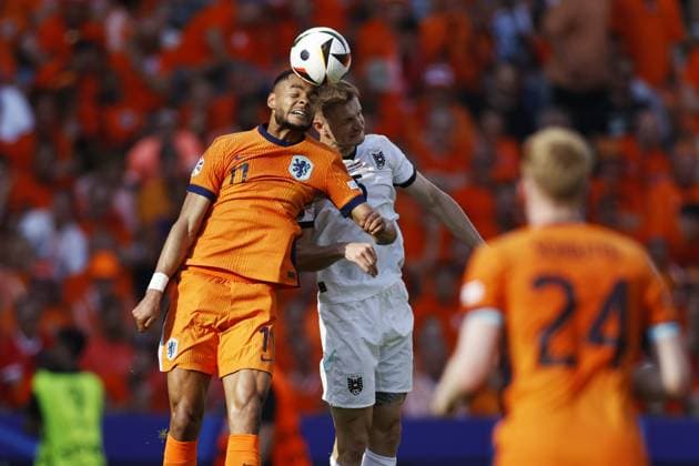 BERLIN - (l-r) Cody Gakpo of Holland, Stefan Posch of Austria during the UEFA EURO, EM, Europameisterschaft,Fussball 2024 group D match between the Netherlands and Austria at the Olympiastadion on June 25, 2024 in Berlin, Germany. ANP MAURICE VAN STEEN UEFA EURO 2024 2024 xVIxANPxSportx xxANPxIVx 502041899 originalFilename: 502041899.jpg