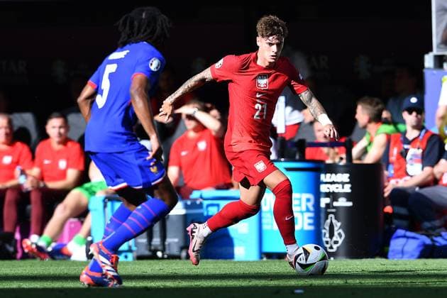 Soccer UEFA EURO 2024 Group Stage 3 Matchday France Poland on 25 06 2024 at BVB Stadion Dortmund in Dortmund Jules Kounde France , left Nicola Zalewski Poland , right xRx