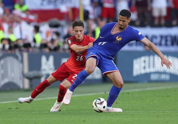 William Saliba of France is challenged by Kacper Urbanski of Poland France v Poland, UEFA European Championship, EM, Europameisterschaft 2024, Group D, Football, BVB Stadion, Dortmund, Germany, 25 Jun 2024 EDITORIAL USE ONLY No use with unauthorised audio, video, data, fixture lists, club league logos or live services. Online in-match use limited to 120 images, no video emulation. No use in betting, games or single club league player publications. Copyright: xPaulxCurrie Shutterstockx 14555523cj