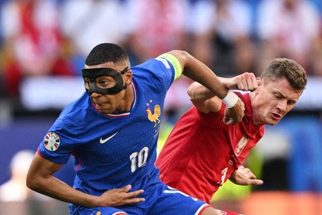 Germany Soccer Euro 2024 France - Poland 8716280 25.06.2024 France s Kylian Mbappe, left, and Poland s Pawel Dawidowicz are seen during the UEFA EURO, EM, Europameisterschaft,Fussball 2024 Group D soccer match between France and Poland at the BVB Stadion Dortmund, in Dortmund, Germany. Alexey Filippov Sputnik Dortmund Germany  Copyright: xAlexeyxFilippovx