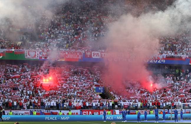 25 06 2024, European Football Championship, UEFA EURO 2024, France Poland, Group D, BVB Stadion Dortmund, v l , Poland Fans ignite pyrotechnics, pyro, smoke, fire, bengalos, smoke bombs, pirotecnica, fumo, fuoco, sparklers Copyright: HMBxMedia