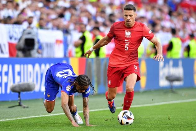 Soccer UEFA EURO 2024 Group Stage 3 Matchday France Poland on 25 06 2024 at BVB Stadion Dortmund in Dortmund Bradley Barcola France , left Jan Bednarek Poland , right xRx