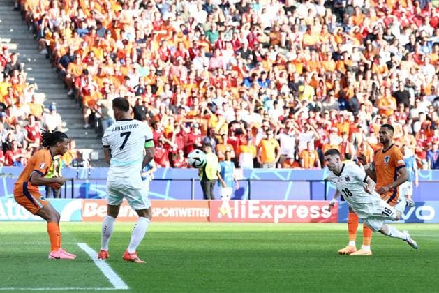 Romano Schmid of Austria scores the sides second goal to make it 2-1 to Austria Netherlands v Austria, UEFA European Championship, EM, Europameisterschaft 2024, Group D, Football, Olympiastadion, Berlin, Germany, 25 Jun 2024 EDITORIAL USE ONLY No use with unauthorised audio, video, data, fixture lists, club league logos or live services. Online in-match use limited to 120 images, no video emulation. No use in betting, games or single club league player publications. Copyright: xMattxWest Shutterstockx 14555517bo