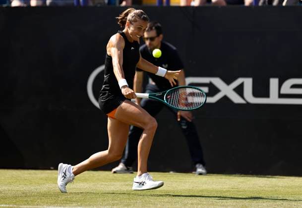 25th June 2024; Devonshire Park, Eastbourne, East Sussex, England: Rothesay International Eastbourne, Day 2, Petra Martic (CRO) plays a backhand against Katie Boulter (GBR) , womens singles  ActionPlus12660463 HongboxChen