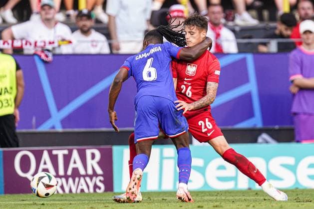2024-06-25 France v Poland - Group D - UEFA EURO, EM, Europameisterschaft,Fussball 2024 DORTMUND, GERMANY - JUNE 25: Kacper Urbanski of Poland, Eduardo Camavinga of France battle for the ball during the Group D - UEFA EURO 2024 match between France and Poland at BVB Stadion Dortmund on June 25, 2024 in Dortmund, Germany. (Photo by Joris Verwijst BSR Agency) Dortmund Germany Content not available for redistribution in The Netherlands directly or indirectly through any third parties. Copyright: xBSRxAgencyx
