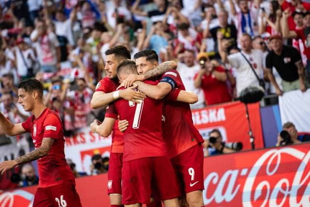 GER, Euro 2024, Group D, France FRA vs Poland POL 25 06 2024, Signal Iduna Park BVB Stadion Dortmund, Dortmund, GER, Euro 2024, Group D, France FRA vs Poland POL Pictured celebrating the goal for 1 1 by Lewandowski Robert Poland POL, 9 and Swiderski Karol Poland Poland POL, 7 hugging each other nordphotoxGmbHxx xChristianxSchulze nph000300