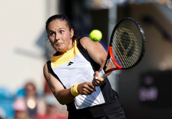 25th June 2024; Devonshire Park, Eastbourne, East Sussex, England: Rothesay International Eastbourne, Day 2, Daria Kasatkina plays a backhand against Xinyu Wang (CHN) , womens singles match  ActionPlus12660492 HongboxChen