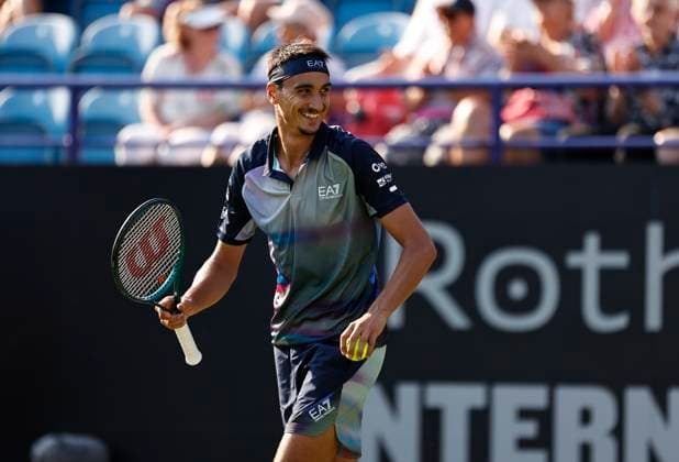 25th June 2024; Devonshire Park, Eastbourne, East Sussex, England: Rothesay International Eastbourne, Day 2; Lorenzo Sonego (ITA) celebrates his victory after defeating Henry Searle (GBR) , mens singles match  ActionPlus12660516 HongboxChen