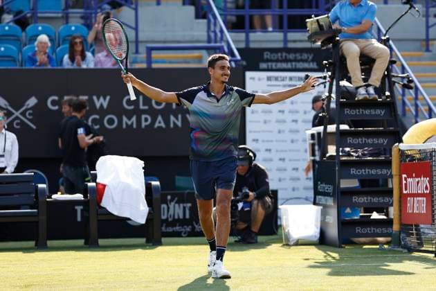 25th June 2024; Devonshire Park, Eastbourne, East Sussex, England: Rothesay International Eastbourne, Day 2; Lorenzo Sonego (ITA) celebrates his victory after defeating Henry Searle (GBR) , mens singles match  ActionPlus12660519 HongboxChen