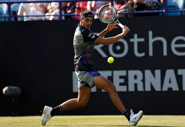 25th June 2024; Devonshire Park, Eastbourne, East Sussex, England: Rothesay International Eastbourne, Day 2; Lorenzo Sonego (ITA) plays a backhand against Henry Searle (GBR) , mens singles match  ActionPlus12660507 HongboxChen