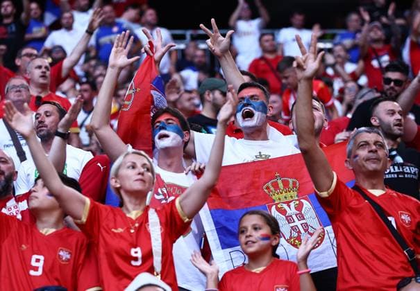 Serbia fans in the stadium ahead of the game Denmark v Serbia, UEFA European Championship, EM, Europameisterschaft 2024, Group C, Football, Munich Football Arena, Munich, Germany, 25 Jun 2024 EDITORIAL USE ONLY No use with unauthorised audio, video, data, fixture lists, club league logos or live services. Online in-match use limited to 120 images, no video emulation. No use in betting, games or single club league player publications. Copyright: xMichaelxZemanek Shutterstockx 14555536y