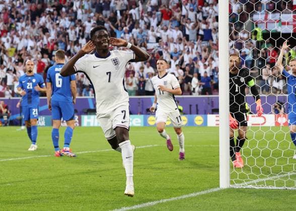 Cologne, Germany, 25th June 2024. Bukayo Saka of England celebrates what he thinks is the first goal before it is rued out for offside during the UEFA European Championships match at Cologne Stadium, Cologne. Picture credit should read: David Klein Sportimage EDITORIAL USE ONLY. No use with unauthorised audio, video, data, fixture lists, club league logos or live services. Online in-match use limited to 120 images, no video emulation. No use in betting, games or single club league player publications. SPI-3205-0039