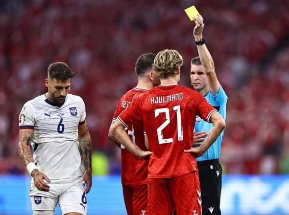 Morten Hjulmand of Denmark is shown a yellow card Denmark v Serbia, UEFA European Championship, EM, Europameisterschaft 2024, Group C, Football, Munich Football Arena, Munich, Germany, 25 Jun 2024 EDITORIAL USE ONLY No use with unauthorised audio, video, data, fixture lists, club league logos or live services. Online in-match use limited to 120 images, no video emulation. No use in betting, games or single club league player publications. Copyright: xMichaelxZemanek Shutterstockx 14555536az