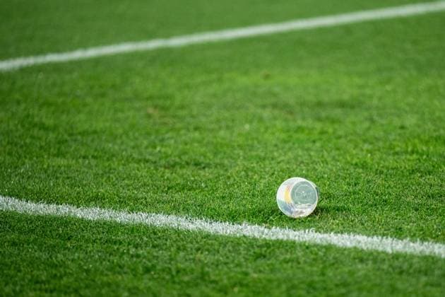 240625 A plastic cup on the pitch during the UEFA Euro 2024 Football Championship match between Denmark and Serbia on June 25, 2024 in Munich Photo Mathias Bergeld BILDBYRAN kod MB MB0940 fotboll football soccer fotballs em europamästerskap em uefa euro uefa european football championship euro 2024 danmark denmark serbien serbia bbeng  Copyright: MATHIASxBERGELD BB240625MB055