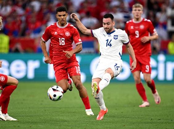 Football Euro 2024 Group C 25 06 2024 Denmark Serbia Alexander Bah left, Denmark v Andrija Å½ivkovic right, Serbia