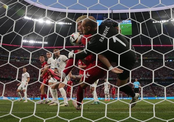 Predrag Rajkovic of Serbia is fouled by Jonas Wind of Denmark and goal is not given Denmark v Serbia, UEFA European Championship, EM, Europameisterschaft 2024, Group C, Football, Munich Football Arena, Munich, Germany, 25 Jun 2024 EDITORIAL USE ONLY No use with unauthorised audio, video, data, fixture lists, club league logos or live services. Online in-match use limited to 120 images, no video emulation. No use in betting, games or single club league player publications. Copyright: xMichaelxZemanek Shutterstockx 14555536bn