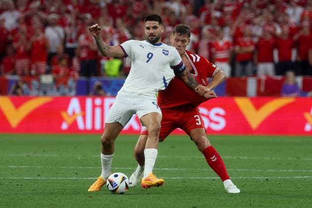 in duel, action, with Aleksandar Mitrovic 9 Serbia , Jannik Vestergaard 3 Denmark , Denmark vs Serbia, Football, UEFA Euro 2024, Group stage, Matchday 3, 25 06 2024 Munich Bavaria Germany Copyright: xkolbert-press ChristianxKolbertx