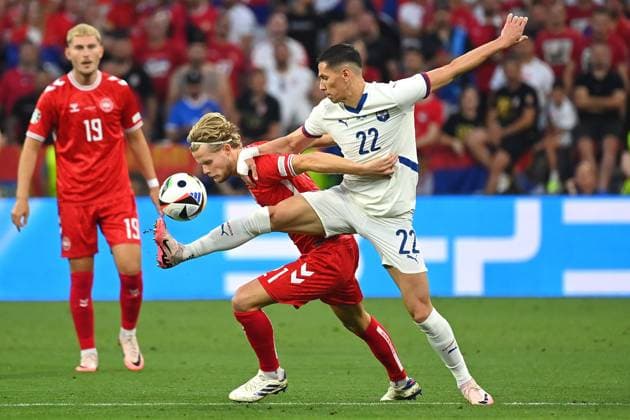 Sasa LUKIC SRB , action,duel against Morten HJULMAND DEN Group Stage Group C Denmark DEN Serbia SRB on 25 06 2024, Football Arena Munich Football UEFA EURO 2024 GERMANY from 14 06 2024 14 07 2024