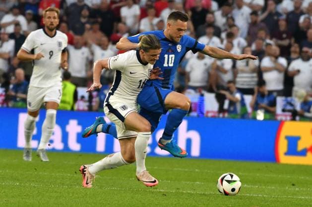Cologne, Germany, June 25st 2024: Timi Elsnik of Slovenia (R) in action against Conor Gallagher of England (L) during the UEFA EURO, EM, Europameisterschaft,Fussball 2024 football match between England and Slovenia at Cologne Stadium, Cologne, Germany. (Natasa Kupljenik SPP)  Copyright: xNatasaxKupljenikx xSPPx spp-en-NaKuSp-NNP_3424