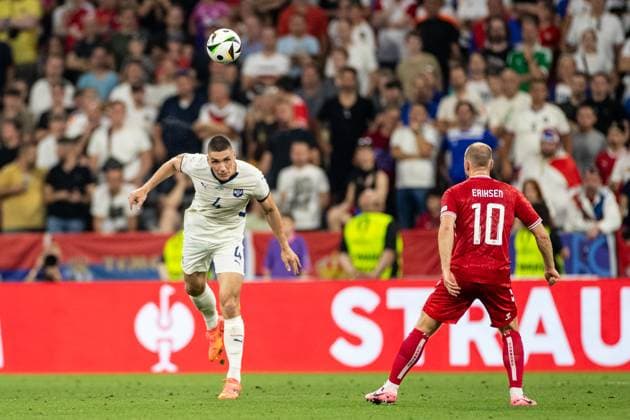 UEFA EURO 2024 Denmark Serbia 25 06 2024 Nikola Milenkovic Serbia, 4 , Christian Eriksen Denmark, 10 UEFA EURO 2024 Denmark Serbia Munich Football Arena, Munich 25 06 2024 Copyright: xBEAUTIFULxSPORTS Buriakovx