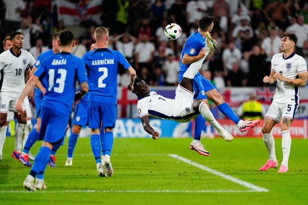 Bukayo Saka of England over head kicks towards goal England v Slovenia, UEFA European Championship, EM, Europameisterschaft 2024, Group C, Football, Cologne Stadium, Cologne, Germany, 25 Jun 2024 EDITORIAL USE ONLY No use with unauthorised audio, video, data, fixture lists, club league logos or live services. Online in-match use limited to 120 images, no video emulation. No use in betting, games or single club league player publications. Copyright: xDavexShopland Shutterstockx 14555527ck