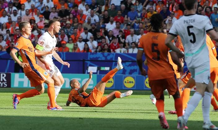 Center Donyell Malen scores the own goal to 0 1 Sport Football Soccer European Championship Euro 2024 European Championship Men Season 2023 2024 25 06 2024 Netherlands NED vs Austria AUT in Berlin DFL regulations prohibit any use of photographs as image sequences and or quasi video