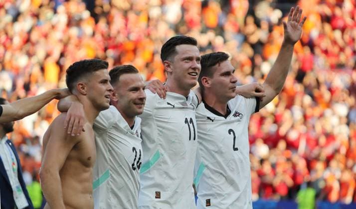 Christoph Baumgartner, Andreas Weimann, Michael Gregoritsch, Maximilian Wöber, Austria Team celebrates victory in front of the fans Joy Emotion Cheering after the end of the match Sport Football Soccer European Championship Euro 2024 European Championship Men Season 2023 2024 25 06 2024 Netherlands NED vs Austria AUT in Berlin DFL regulations prohibit any use of photographs as image sequences and or quasi video