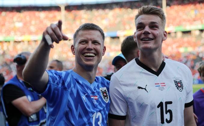Goalkeeper Patrick Pentz, Philipp Lienhart, Austria Team celebrates victory in front of the fans Joy Emotion Cheering after the end of the match Sports Football Soccer European Championship Euro 2024 European Championship Men Season 2023 2024 25 06 2024 Netherlands NED vs Austria AUT in Berlin DFL regulations prohibit any use of photographs as image sequences and or quasi video