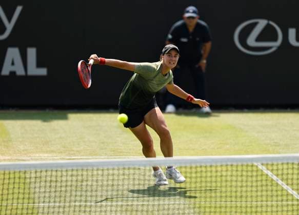 26th June 2024; Devonshire Park, Eastbourne, East Sussex, England: Rothesay International Eastbourne, Day 3, Anhelina Kalinina (UKR) plays a backhand against Madison Keys (USA) , womens singles match  ActionPlus12660745 HongboxChen