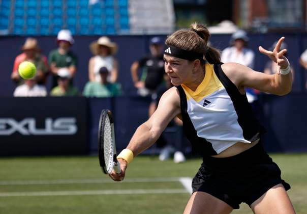 26th June 2024; Devonshire Park, Eastbourne, East Sussex, England: Rothesay International Eastbourne, Day 3, Karolina Muchova (CZE) plays a backhand against Magda Linette (POL) , womens singles match  ActionPlus12660735 HongboxChen