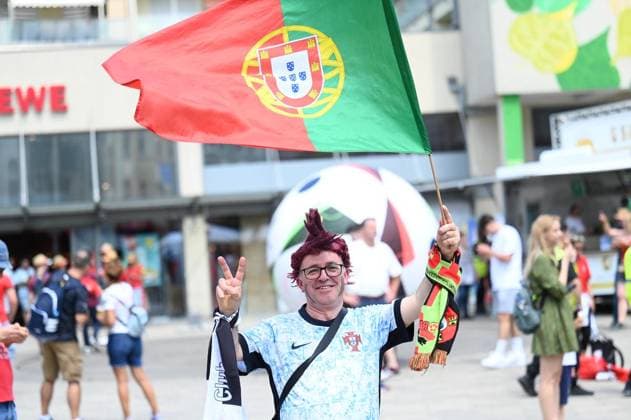 Soccer Euro 2024 in Gelsenkirchen FOR EDITORIAL PURPOSES ONLY p Fans celebrate the teams of Portugal and Georgia on Wednesday, 26 6 2024 in Gelsenkirchen before the match of the European Football Championship in the Veltins Arena Germany NRW Gelsenkirchen Copyright IngoxOtto Copyright: IngoxOtto doc7w1csgdzohd1l3zn03cp ,EDITORIAL USE ONLY Copyright: IngoxOtto