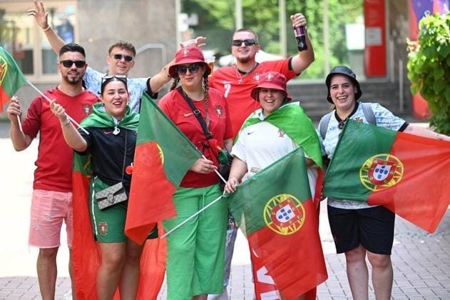 Soccer Euro 2024 in Gelsenkirchen FOR EDITORIAL PURPOSES ONLY p Fans celebrate the teams of Portugal and Georgia on Wednesday, 26 6 2024 in Gelsenkirchen before the match of the European Football Championship in the Veltins Arena Germany NRW Gelsenkirchen Copyright IngoxOtto Copyright: IngoxOtto doc7w1cw46lbjq1cewf8ely ,EDITORIAL USE ONLY Copyright: IngoxOtto