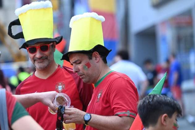 Soccer Euro 2024 in Gelsenkirchen FOR EDITORIAL PURPOSES ONLY p Fans celebrate the teams of Portugal and Georgia on Wednesday, 26 6 2024 in Gelsenkirchen before the match of the European Football Championship in the Veltins Arena Germany NRW Gelsenkirchen Copyright IngoxOtto Copyright: IngoxOtto doc7w1d5ep1h8w1b17zy3cp ,EDITORIAL USE ONLY Copyright: IngoxOtto