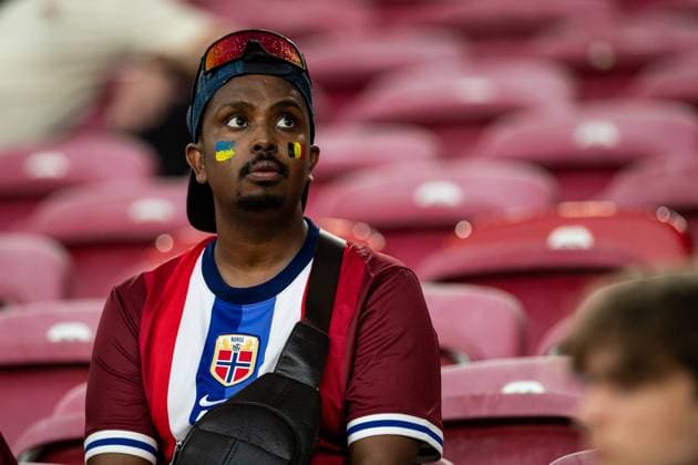 UEFA EURO 2024 Ukraine Belgium 26 06 2024 a fan with 2 flags on his face, Ukraine, Belgium UEFA EURO 2024 Ukraine Belgium Stuttgart Stadium, Stuttgart 26 06 2024 Copyright: xBEAUTIFULxSPORTS Buriakovx