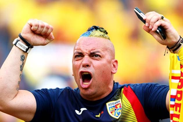 A Romanian fan chants ahead of the game Slovakia v Romania, UEFA European Championship, EM, Europameisterschaft 2024, Group E, Football, Frankfurt Arena, Frankfurt am Main, Germany - 26 Jun 2024 EDITORIAL USE ONLY No use with unauthorised audio, video, data, fixture lists, club league logos or live services. Online in-match use limited to 120 images, no video emulation. No use in betting, games or single club league player publications. Copyright: xKieranxMcManus Shutterstockx 14555603d