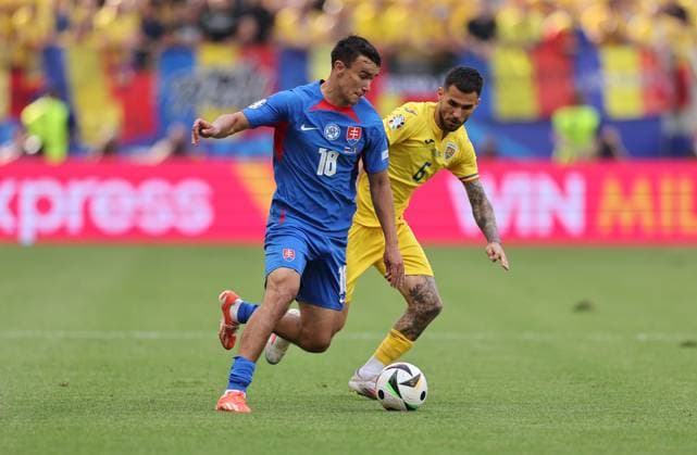 26 06 2024, European Football Championship, UEFA EURO 2024, Slovakia Romania, Group E, Arena Frankfurt, f l , David Strelec Slovakia , Marius Mihai Marin Romania Copyright: HMBxMedia
