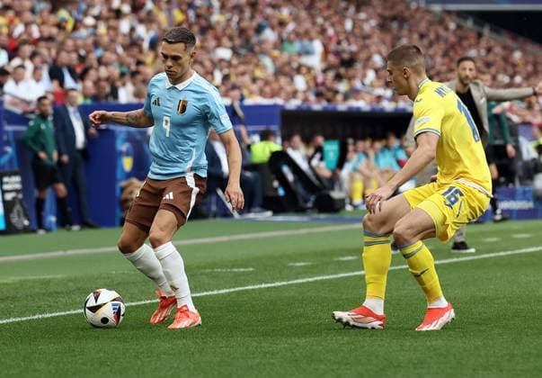Belgium s Leandro Trossard and Ukraine s Viktor Tsyhankov pictured in action during a soccer game between Ukraine and Belgian national soccer team Red Devils, Wednesday 26 June 2024 in Stuttgart, Germany, the third match in the group stage of the UEFA EURO, EM, Europameisterschaft,Fussball 2024 European championships. DIRKxWAEM  x95322769x