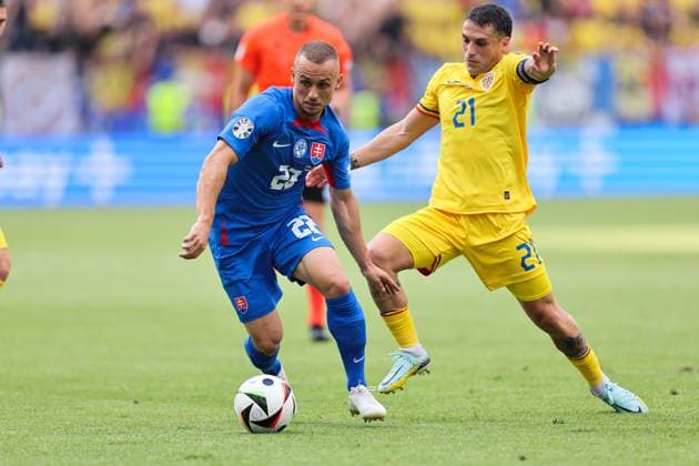 26 06 2024, European Football Championship, UEFA EURO 2024, Slovakia Romania, Group E, Arena Frankfurt, f l , Stanislav Lobotka Slovakia , Nicolae Claudiu Stanciu Romania Copyright: HMBxMedia