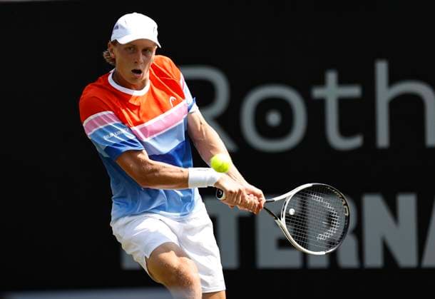 26th June 2024; Devonshire Park, Eastbourne, East Sussex, England: Rothesay International Eastbourne, Day 3; Emil Ruusuvuori (Fin) plays a backhand against Juncheng Shang (CHN) , mens singles match  ActionPlus12660806 HongboxChen