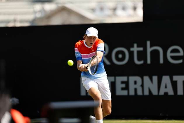 26th June 2024; Devonshire Park, Eastbourne, East Sussex, England: Rothesay International Eastbourne, Day 3; Emil Ruusuvuori (Fin) plays a backhand against Juncheng Shang (CHN) , mens singles match  ActionPlus12660807 HongboxChen