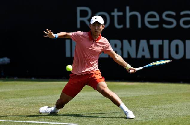 26th June 2024; Devonshire Park, Eastbourne, East Sussex, England: Rothesay International Eastbourne, Day 3; Juncheng Shang (CHN) plays a forehand against Emil Ruusuvuori (Fin), mens singles match  ActionPlus12660813 HongboxChen