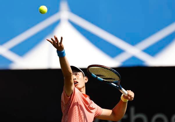 26th June 2024; Devonshire Park, Eastbourne, East Sussex, England: Rothesay International Eastbourne, Day 3; Juncheng Shang (CHN) serves to Emil Ruusuvuori (Fin) , mens singles match  ActionPlus12660819 HongboxChen