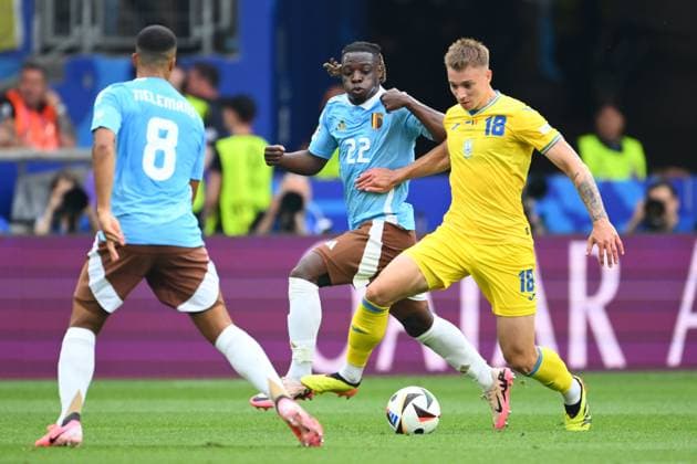 Ukraine v Belgium Group E - UEFA EURO, EM, Europameisterschaft,Fussball 2024 STUTTGART, GERMANY - JUNE 26 : Doku Jeremy forward of Belgium and Volodymyr Brazhko midfielder of Ukraine in action pictured during the UEFA EURO 2024 European Football Championship tournament group E stage match between Ukraine and Belgium at Stuttgart Arena on June 26, 2024 in Stuttgart, Germany, 26 06 2024 Stuttgart Germany  Copyright: xVincentxKalutx