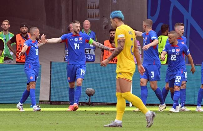 26 06 2024, xsltx, Football EM 2024, Slovakia Romania emspor, v l Ondrej Duda Slovakia Goal scored, erziehlt das Tor zum 1 0 celebrate the goal, Der Torjubel zum DFL DFB REGULATIONS PROHIBIT ANY USE OF PHOTOGRAPHS as IMAGE SEQUENCES and or QUASI VIDEO Frankfurt