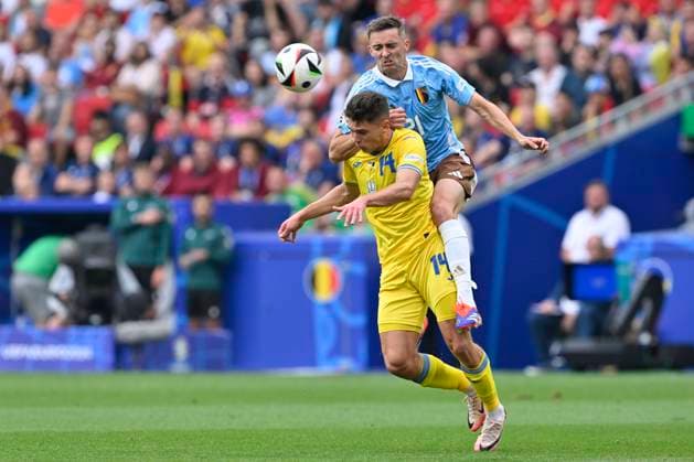 Ukraine v Belgium Group E - UEFA EURO, EM, Europameisterschaft,Fussball 2024 STUTTGART, GERMANY - JUNE 26 : Heorhiy Sudakov midfielder of Ukraine battles for the ball with Castagne Timothy defender of Belgium during the UEFA EURO 2024 European Football Championship tournament group E stage match between Ukraine and Belgium at Stuttgart Arena on June 26, 2024 in Stuttgart, Germany, 26 06 2024 Stuttgart Germany  Copyright: xDhax