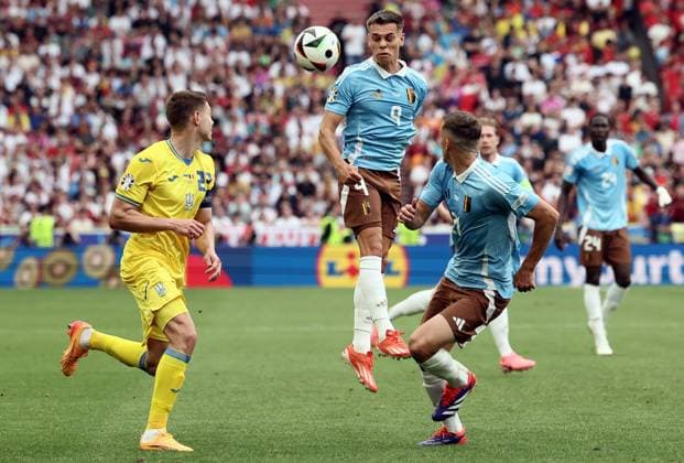 Ukraine s Mykola Matviyenko, Belgium s Leandro Trossard and Belgium s Timothy Castagne pictured in action during a soccer game between Ukraine and Belgian national soccer team Red Devils, Wednesday 26 June 2024 in Stuttgart, Germany, the third match in the group stage of the UEFA EURO, EM, Europameisterschaft,Fussball 2024 European championships. BRUNOxFAHY  x95324397x